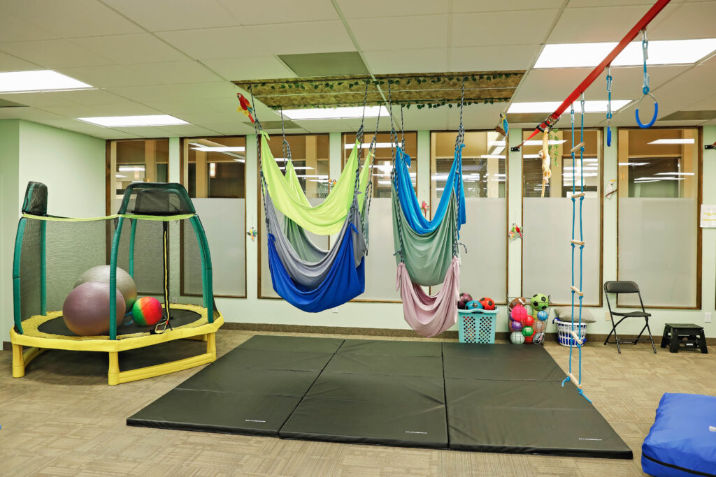 occupational therapy can help improve a child's upper body strength, grip strength, coordination, and overall motor skills